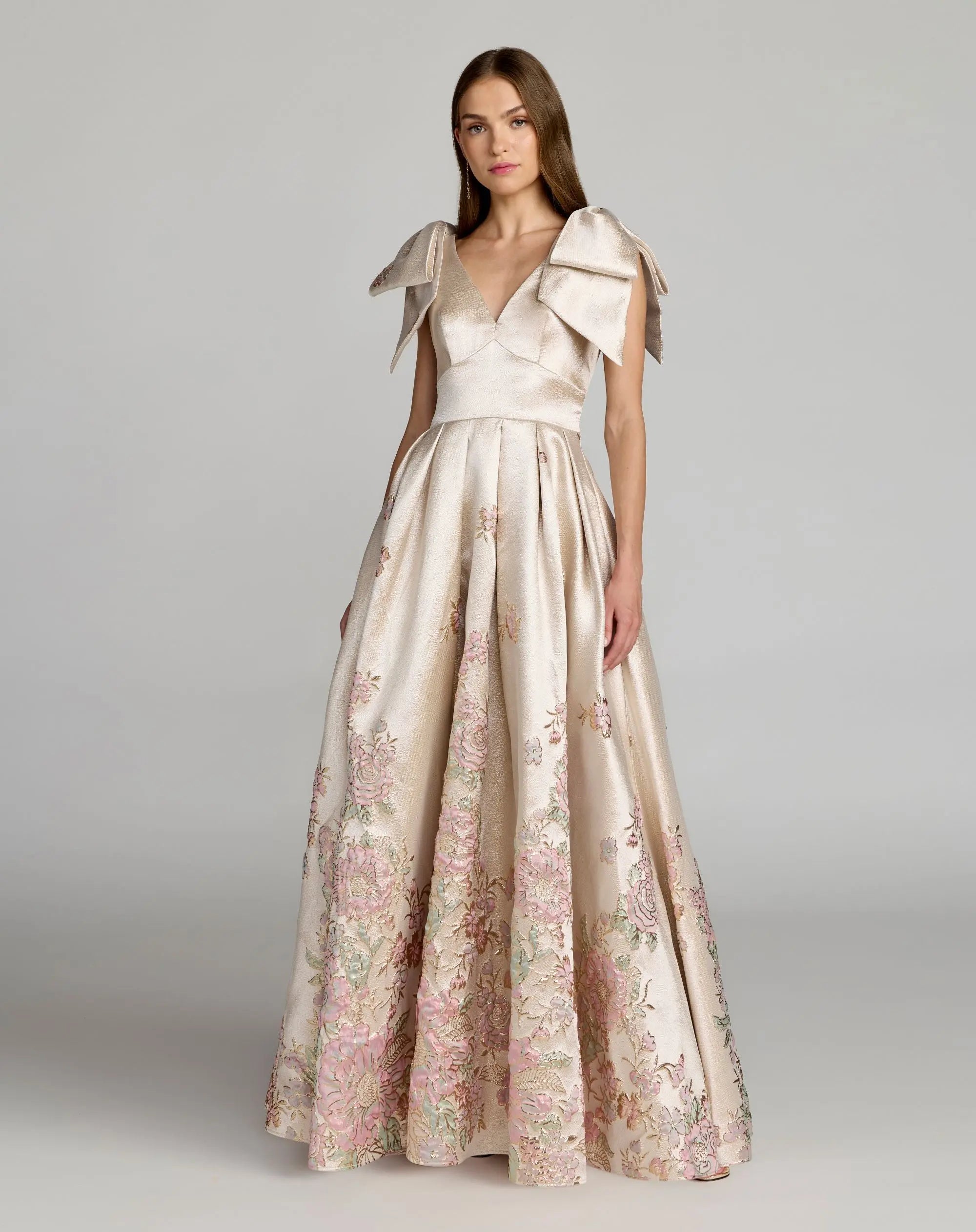 Ivory Brocade V Neck Ball Gown With Bow Straps | Mac Duggal Ivory Brocade V Neck Ball Gown With Bow Straps | Mac Duggal