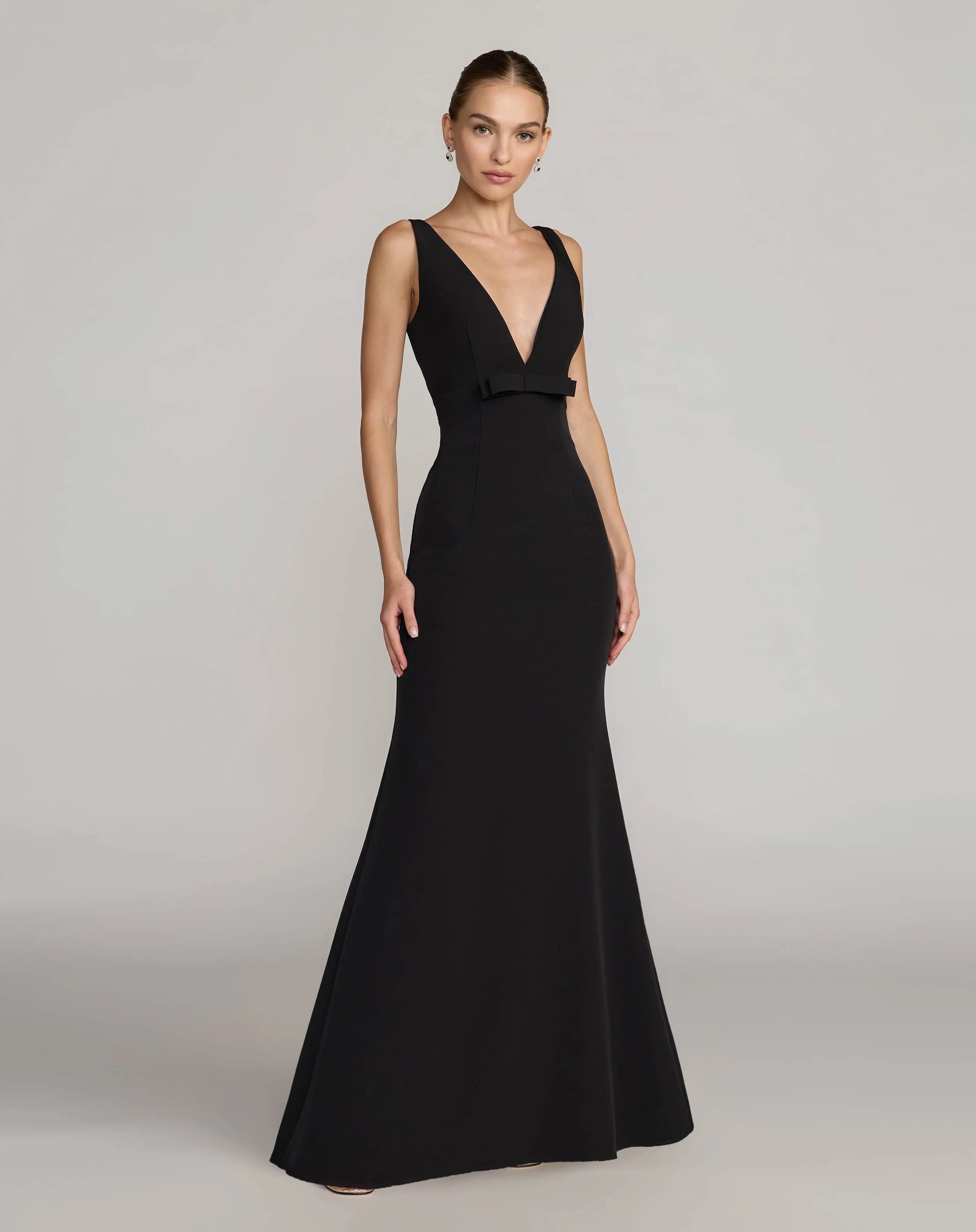 Black Sleeveless V Neck Mermaid Gown With Bow | Mac Duggal Black Sleeveless V Neck Mermaid Gown With Bow | Mac Duggal