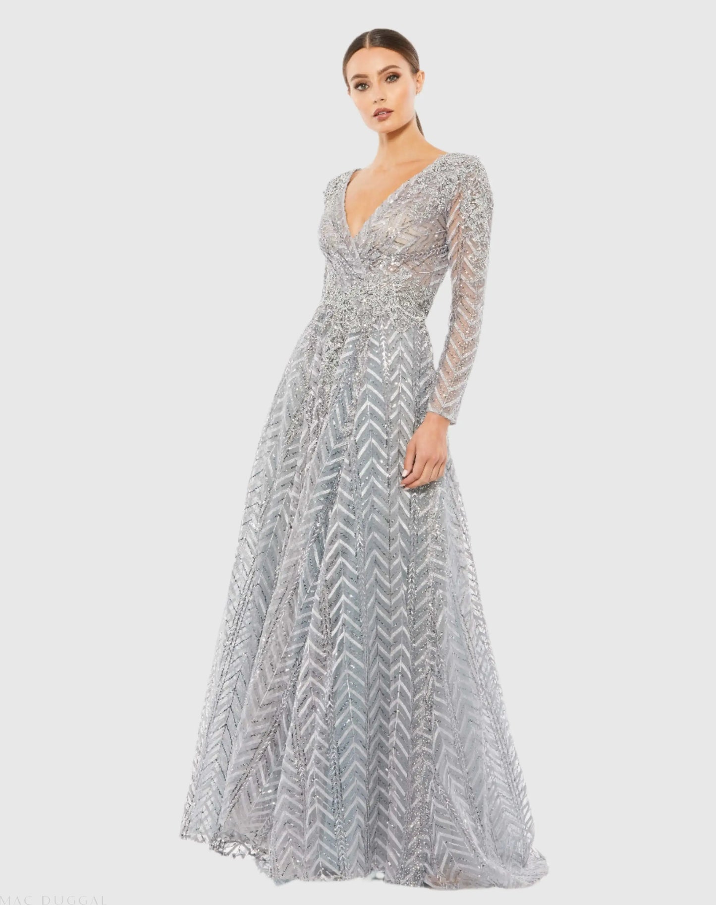 Silver Embellished Illusion Long Sleeve Wrap Over A Line Gown