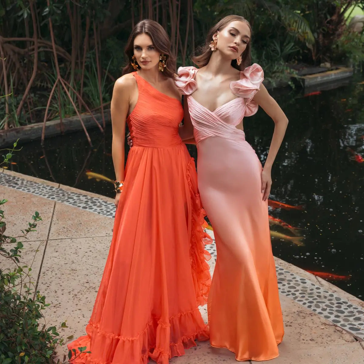 Strapless beaded light blue gown and pink beaded strapless prom dress