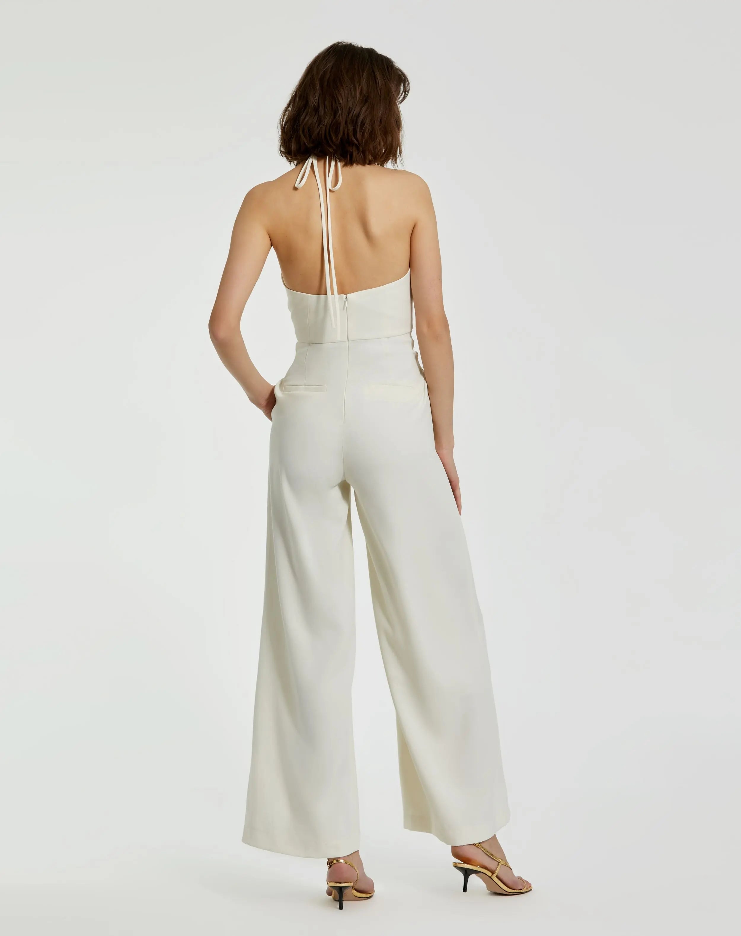 White Crepe Halter Neck Jumpsuit With Flower - Mac Duggal