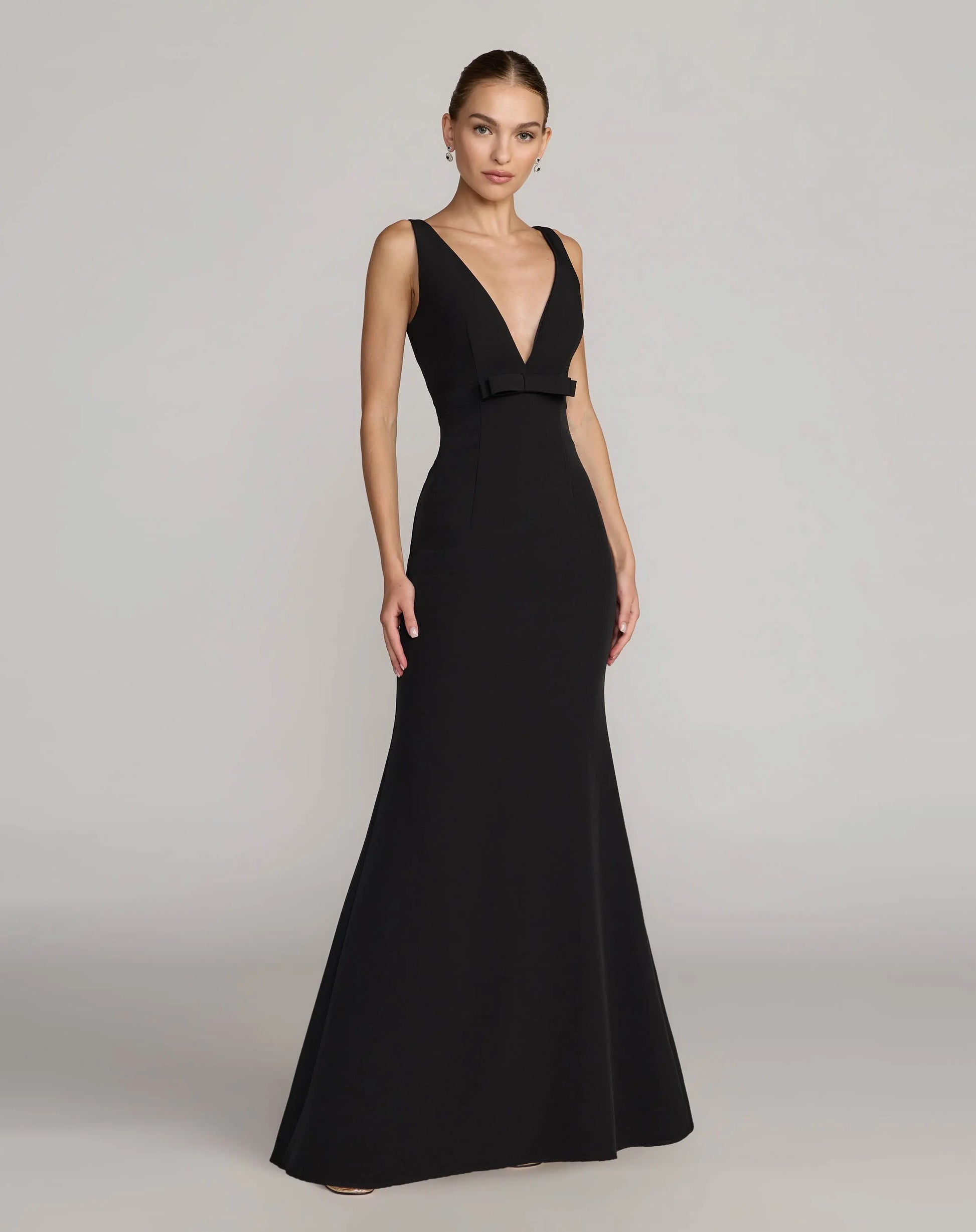 Black Sleeveless V Neck Mermaid Gown With Bow | Mac Duggal Black Sleeveless V Neck Mermaid Gown With Bow | Mac Duggal