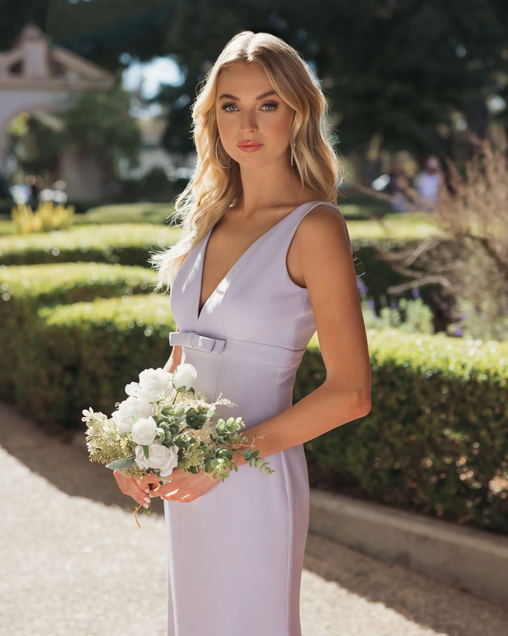 Purple Sleeveless V Neck Mermaid Gown With Bow | Mac Duggal Purple Sleeveless V Neck Mermaid Gown With Bow | Mac Duggal
