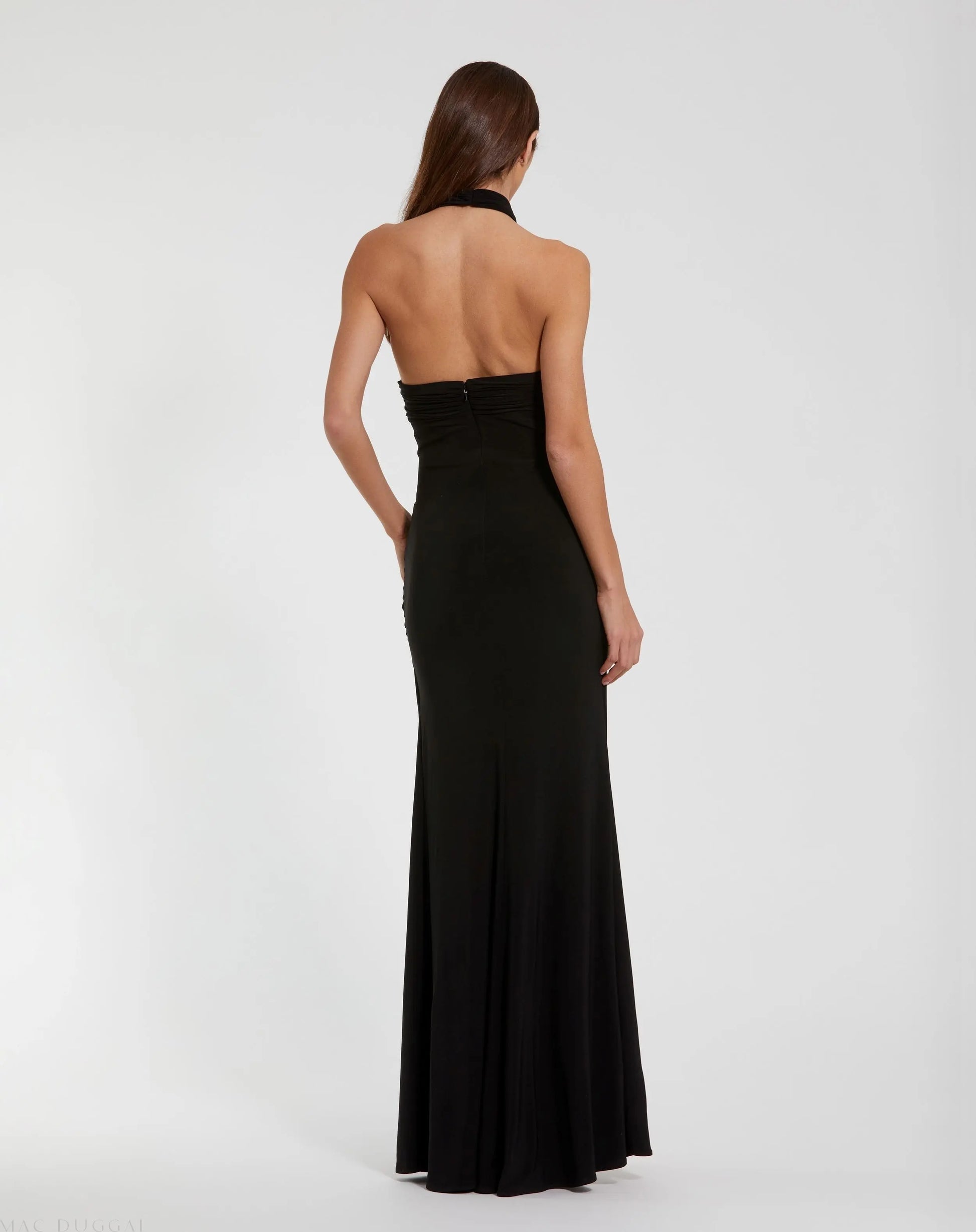 Black Jersey Crossover Halter Neck Gown With 3D Flower | Mac Duggal Black Jersey Crossover Halter Neck Gown With 3D Flower | Mac Duggal