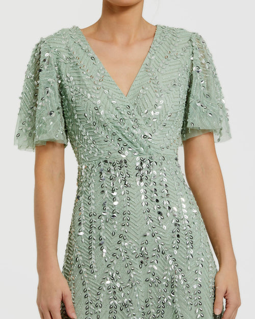 Green Beaded Wrap Over Butterfly Sleeve Column Gown