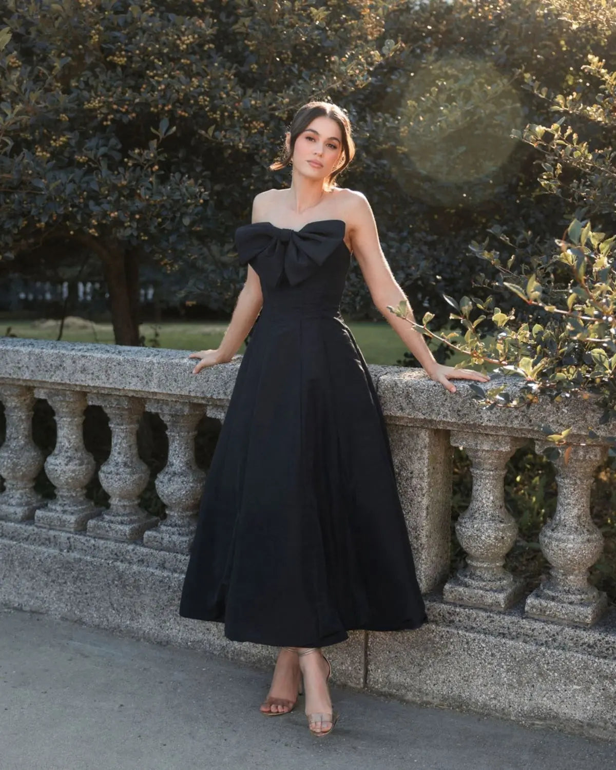 Black Strapless A-Line Tea Length Statement Bow Dress Black Strapless A-Line Tea Length Statement Bow Dress