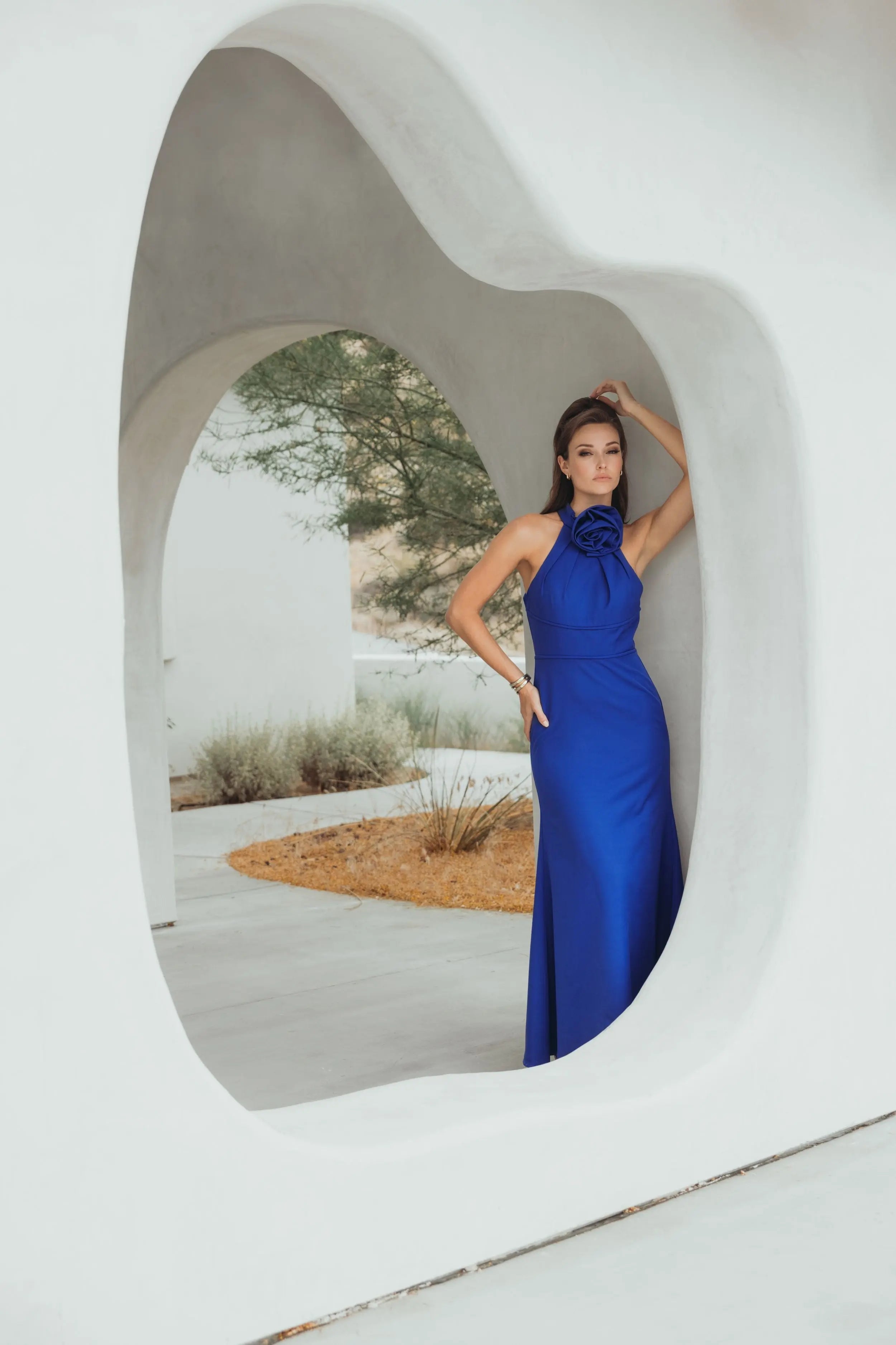 Blue Sleeveless Halter Neck Crepe Gown with Rosette Detail - Ieena for Mac Duggal