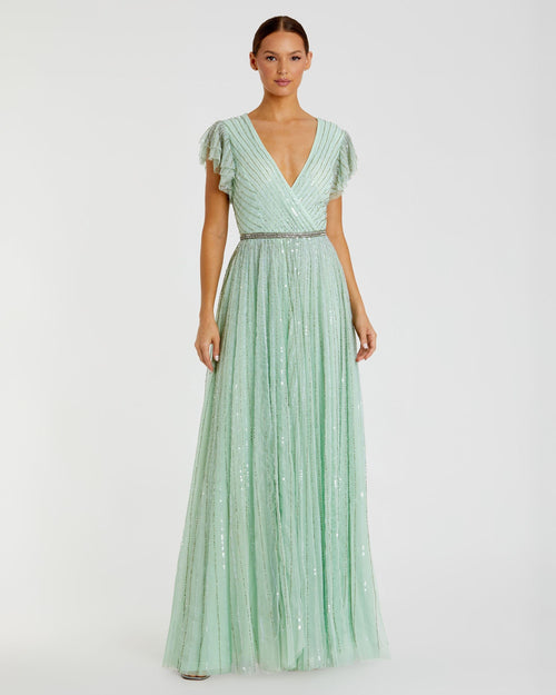 Green Sequined Wrap Over Ruffled Cap Sleeve Gown