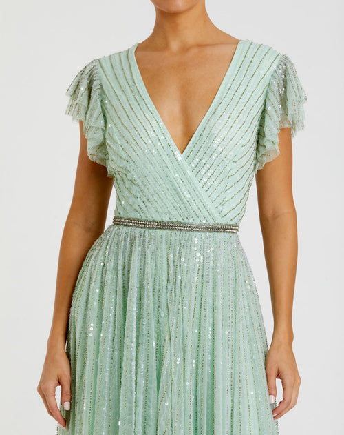 Sequined Wrap Over Ruffled Cap Sleeve Gown