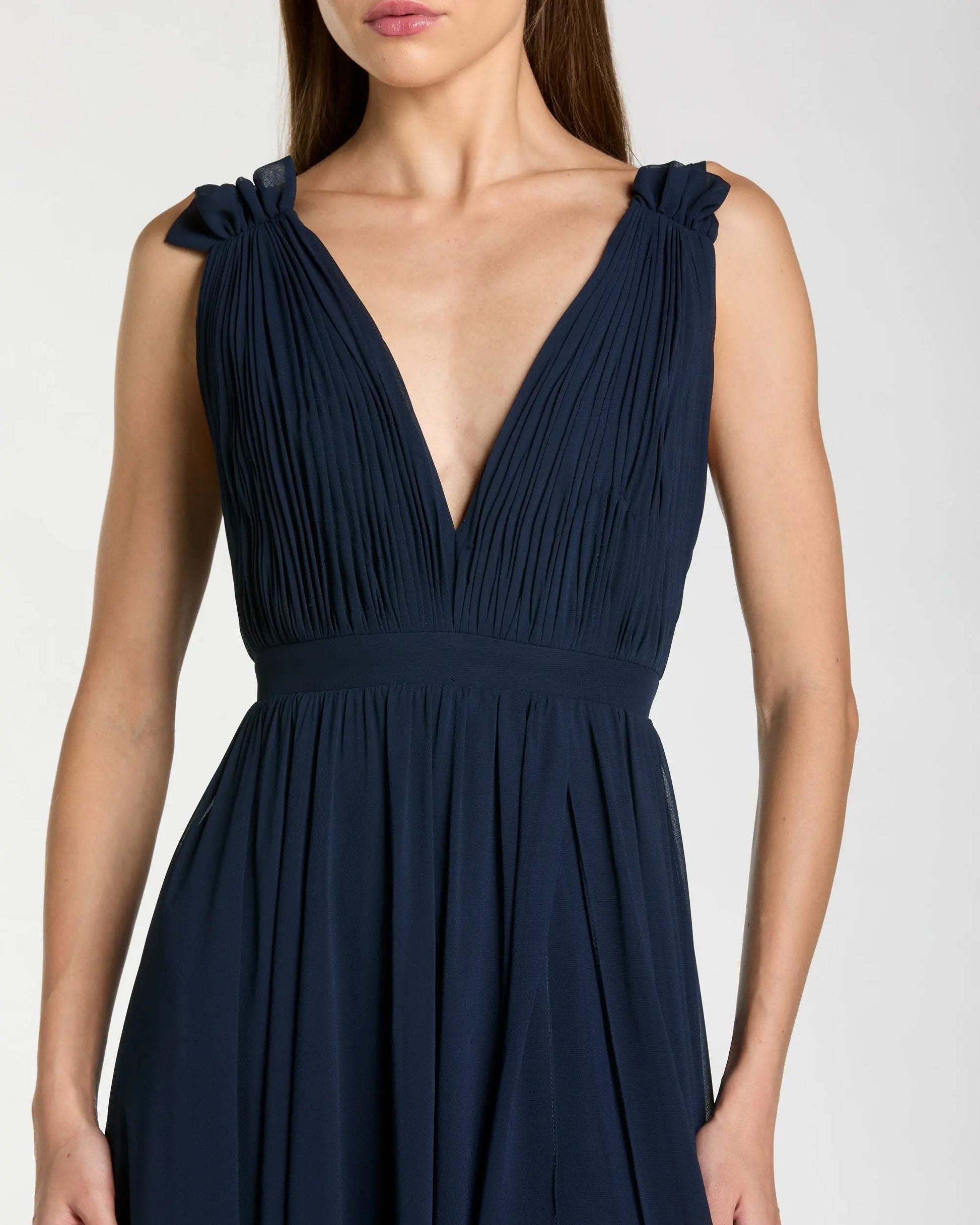 Navy Sleeveless Pleated Chiffon V-Neck Gown | Mac Duggal Navy Sleeveless Pleated Chiffon V-Neck Gown | Mac Duggal