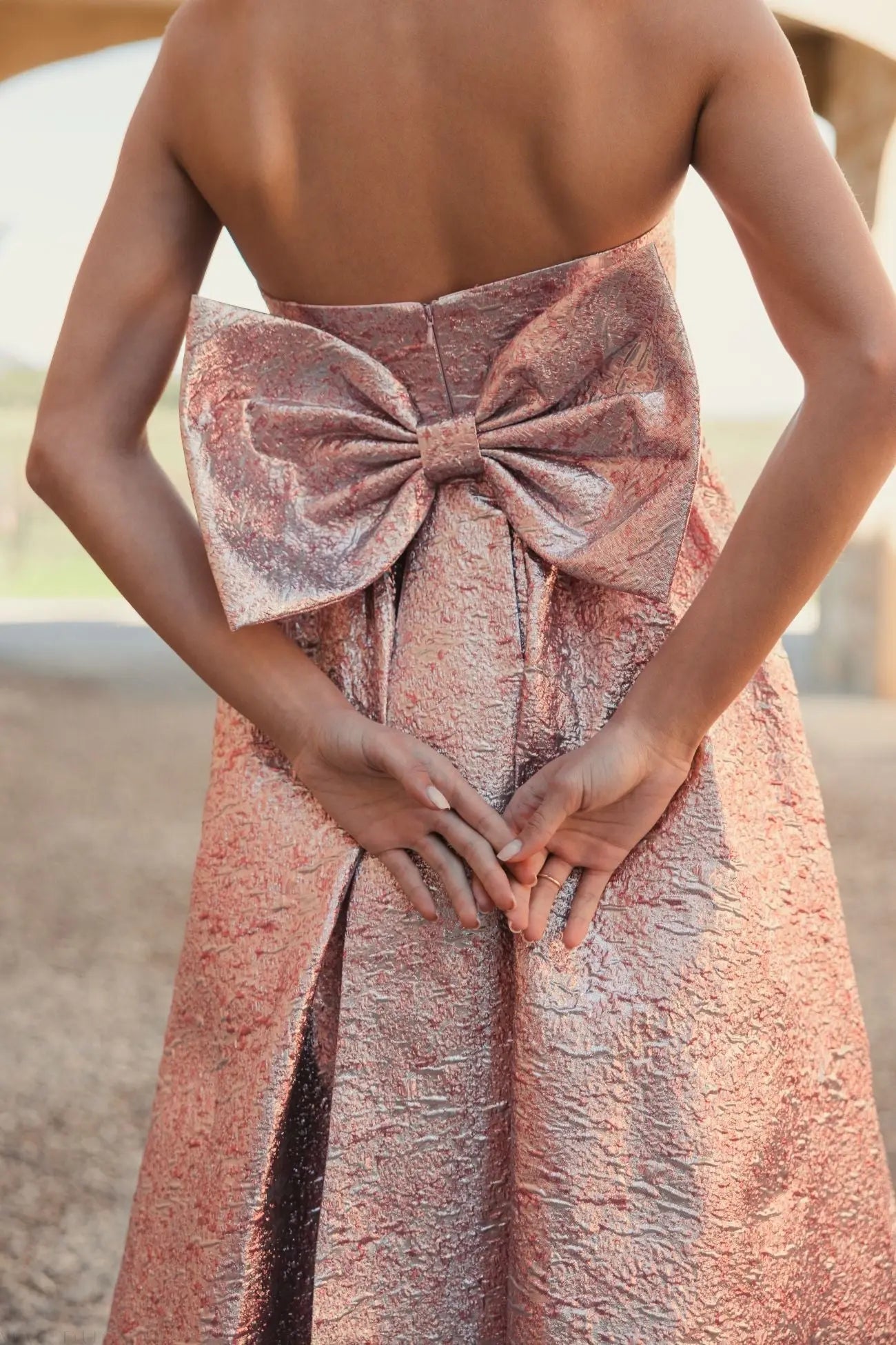 pink metallic strapless dress Mac Duggal - Pink Metallic Strapless Brocade Gown With Oversized Bow