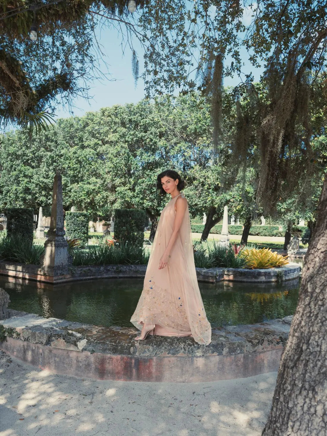 Beige High Neck Floral Embellished Trapeze Gown Beige High Neck Floral Embellished Trapeze Gown