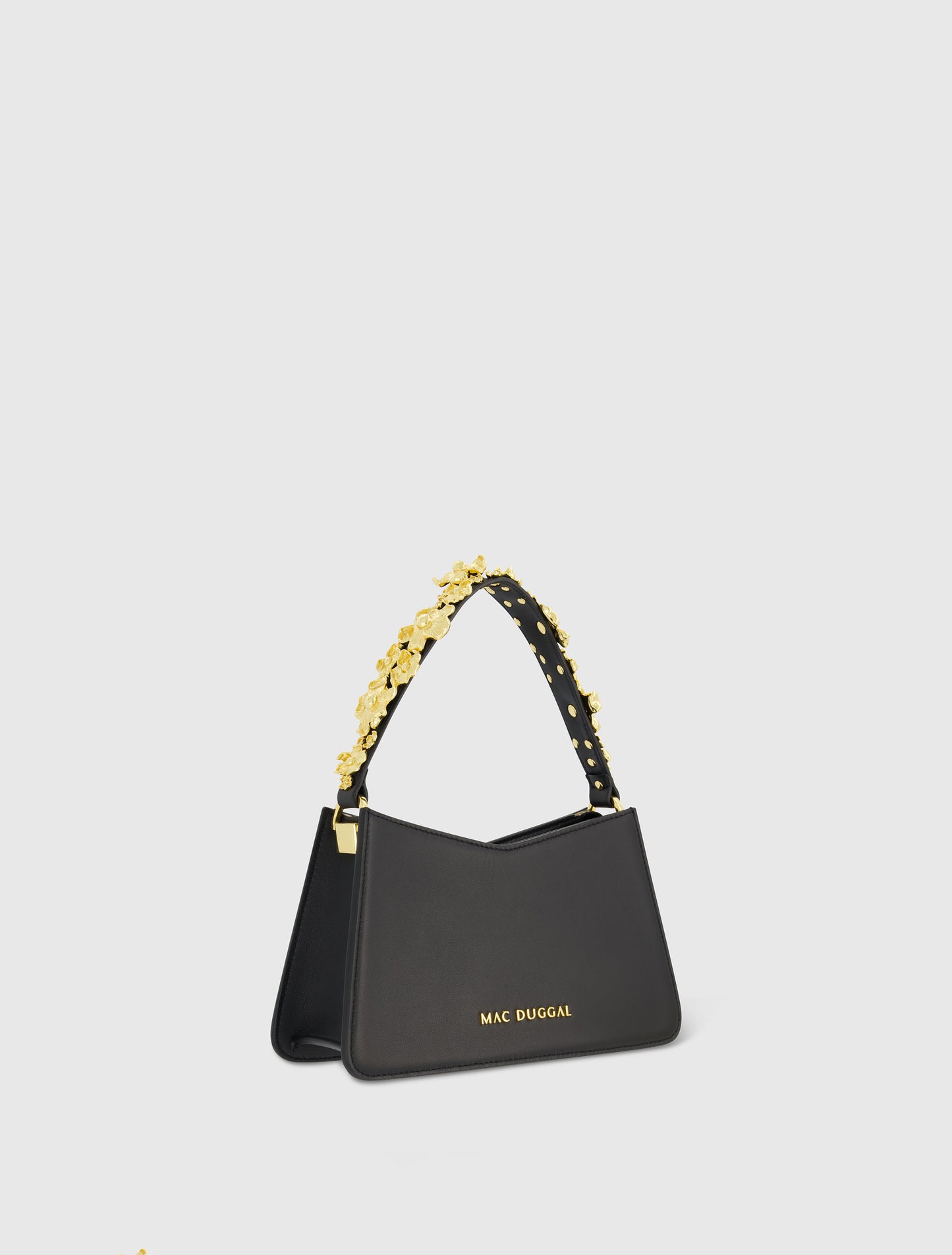 Bolso bandolera pequeño de piel de napa negra con estampado floral dorado