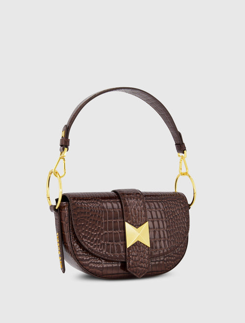 Bolso Saddle de piel de cocodrilo con herrajes dorados