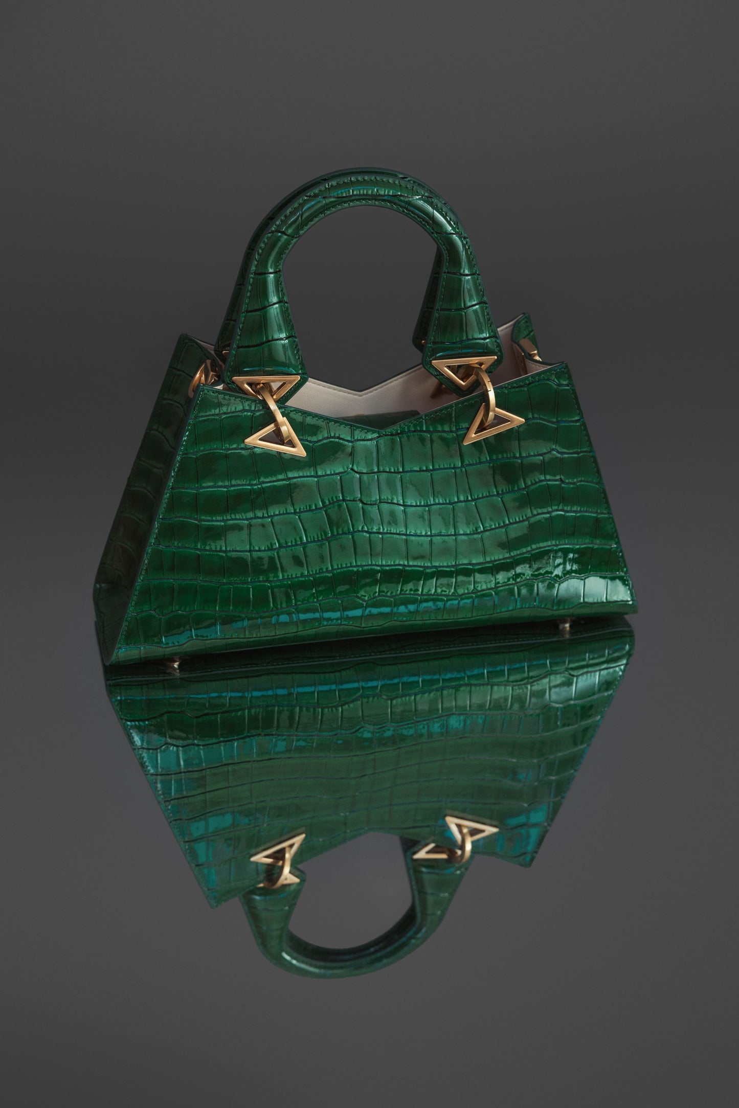 Borsa a mano in pelle di coccodrillo verde con hardware dorato