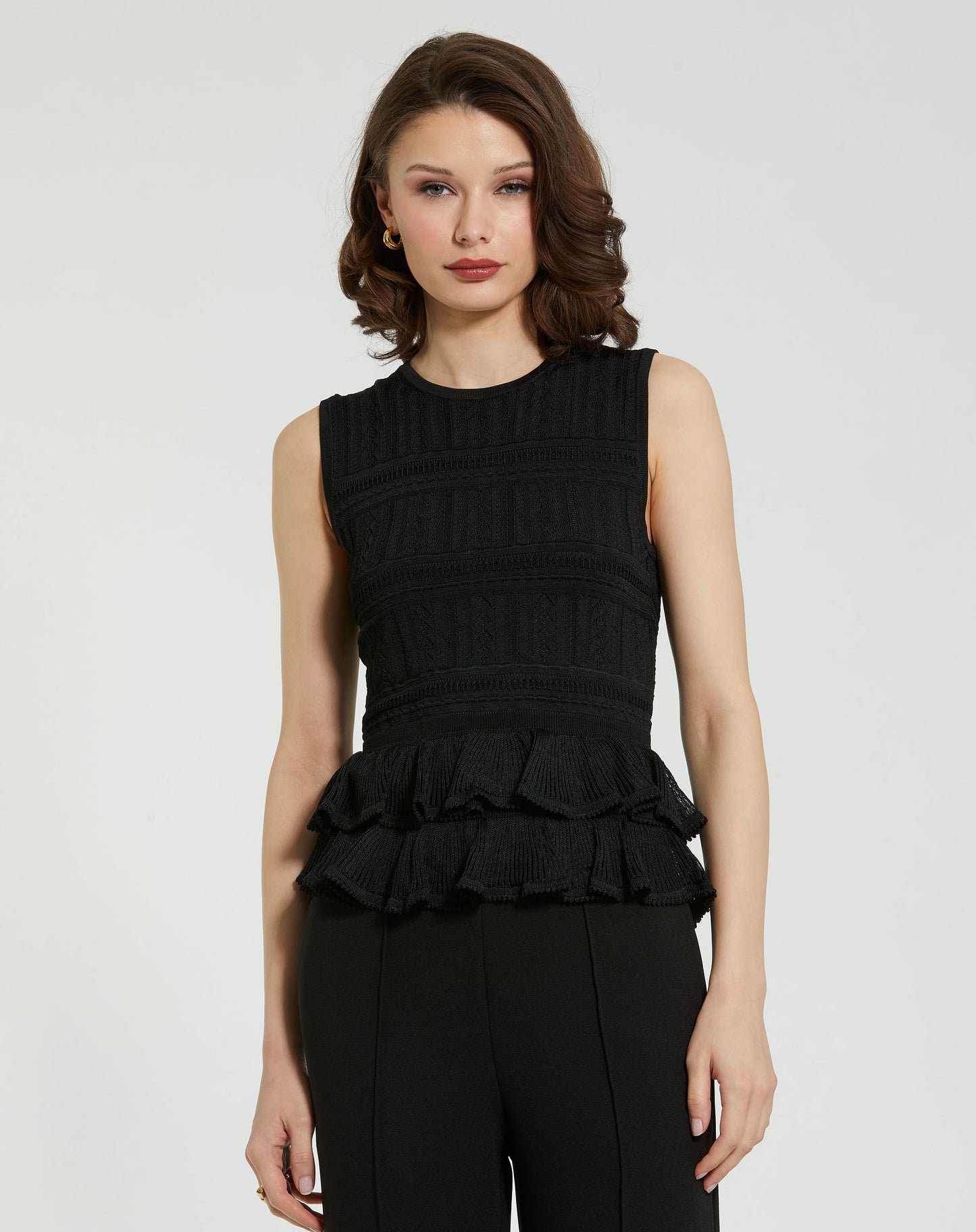 Sleeveless High Neck Knit Top With Ruffle Hem