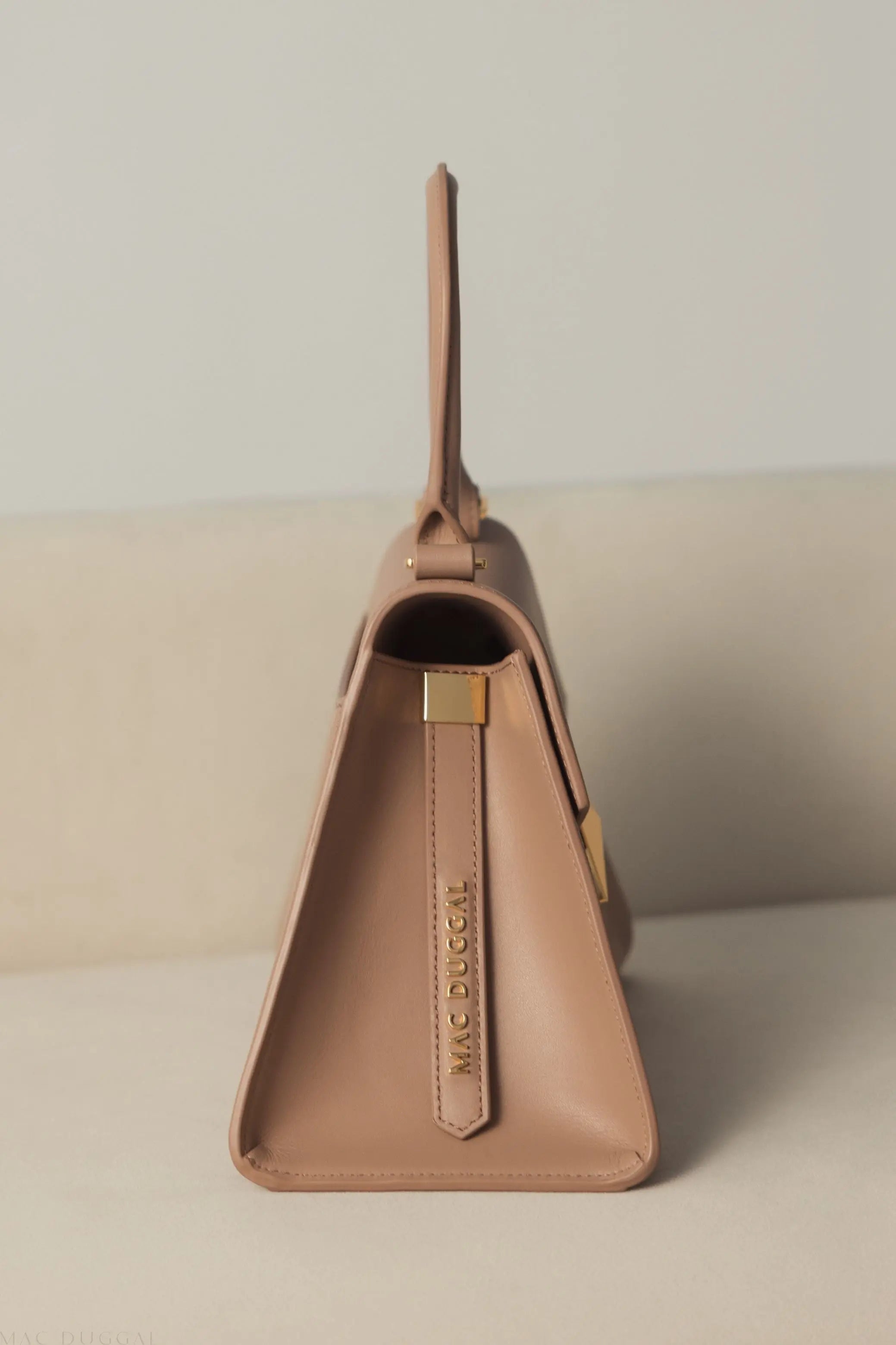 Angular Small Taupe Leather Handbag With Gold Hardware - Mac Duggal