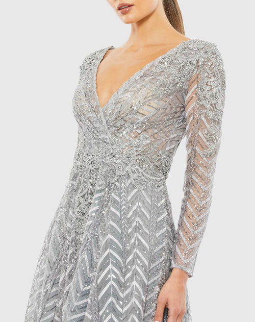 Embellished Illusion Long Sleeve Wrap Over A Line Gown