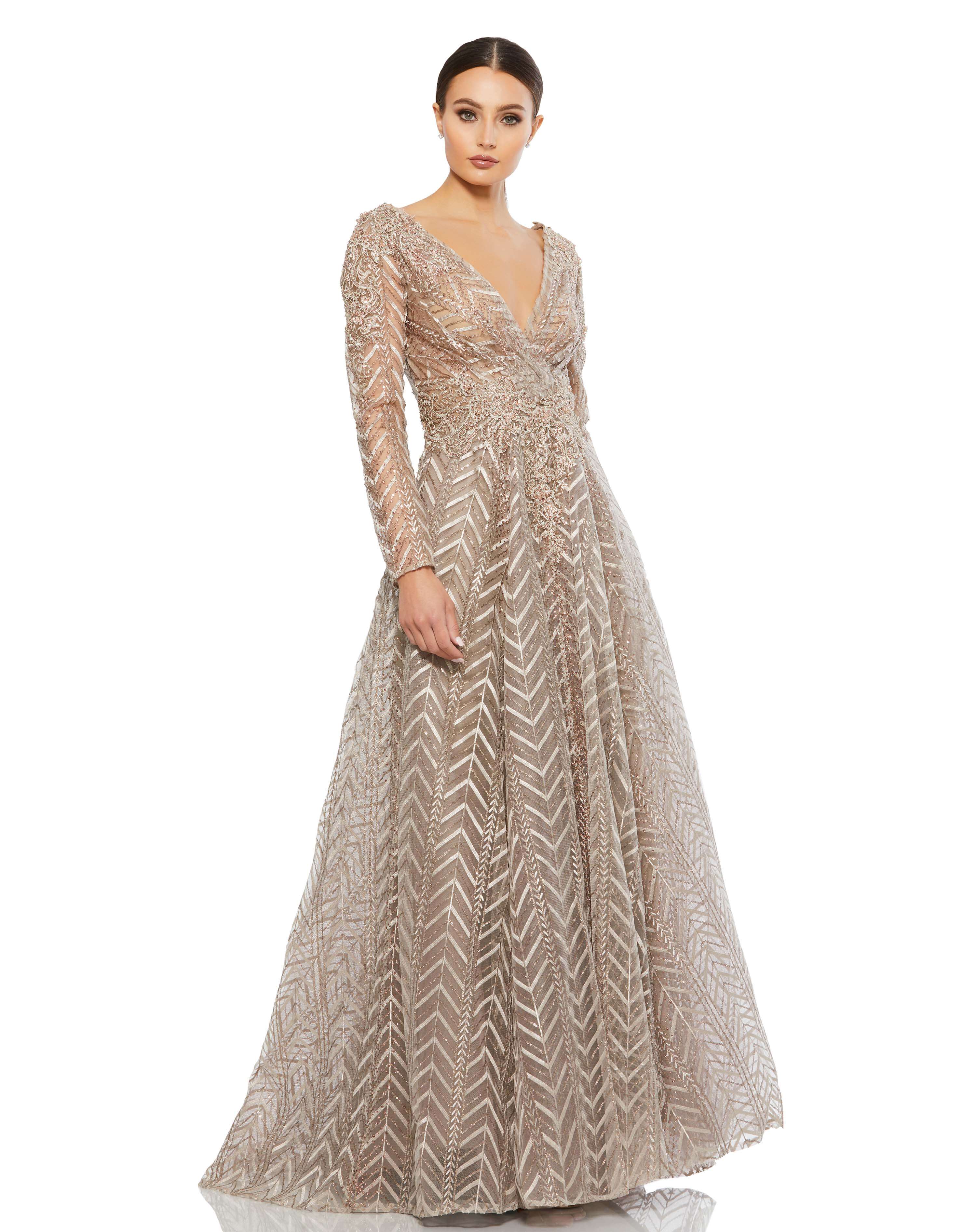 Embellished Illusion Long Sleeve Wrap Over A Line Gown