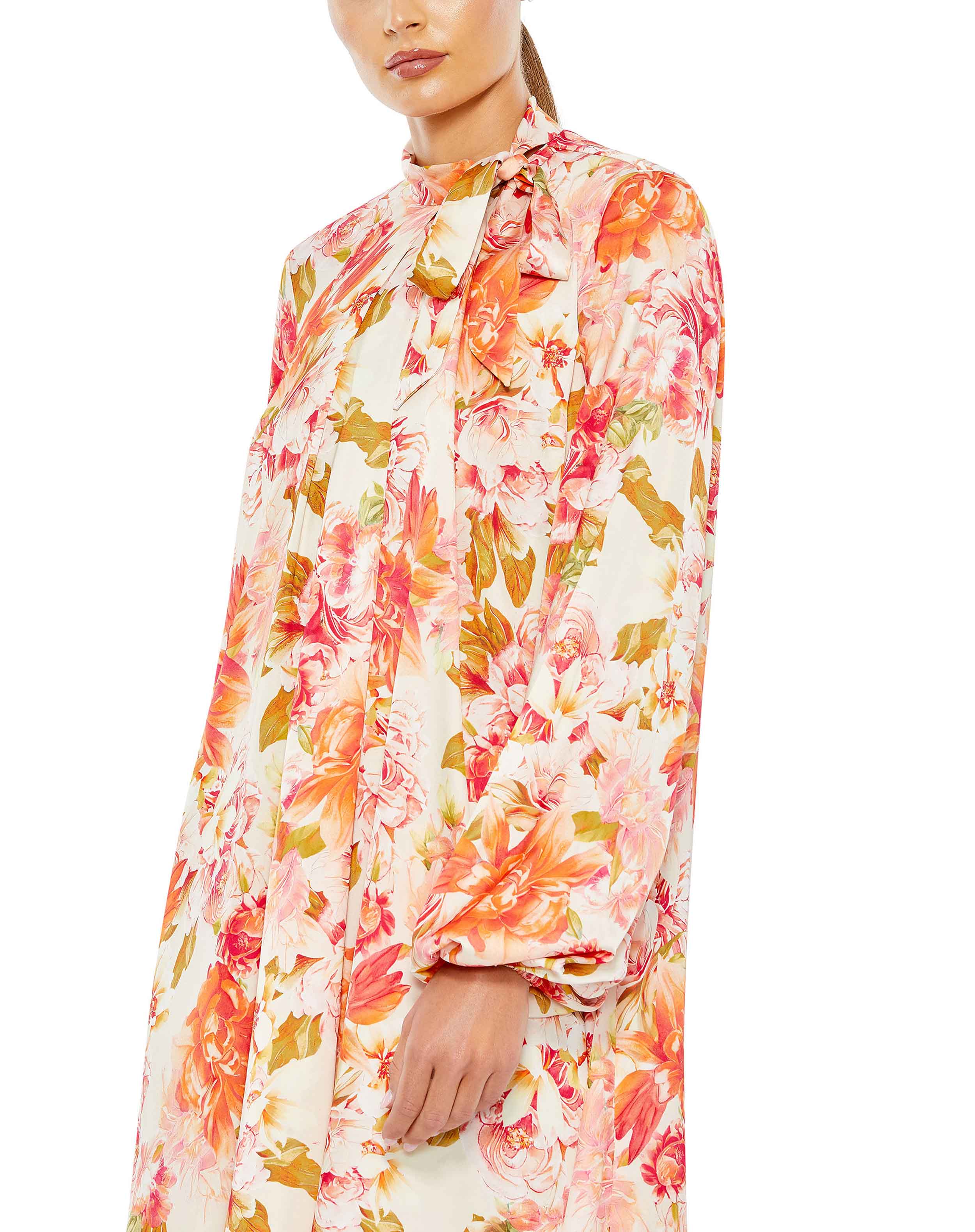 Mini-robe fluide à imprimé floral, col haut, manches bouffantes et cravate