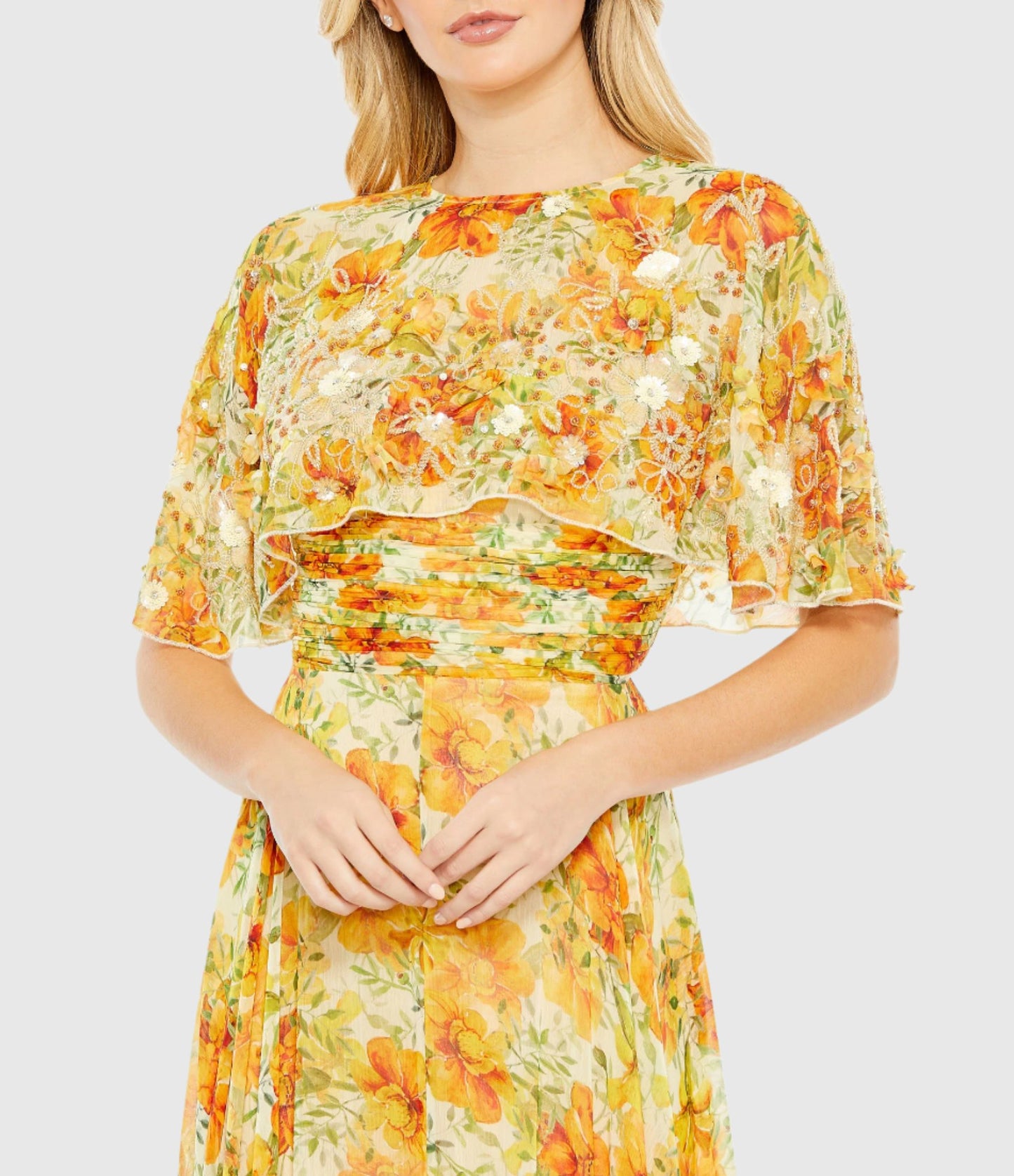 Kleid in A-Linie mit Blumenmuster, hohem Kragen und Cape-Ärmeln